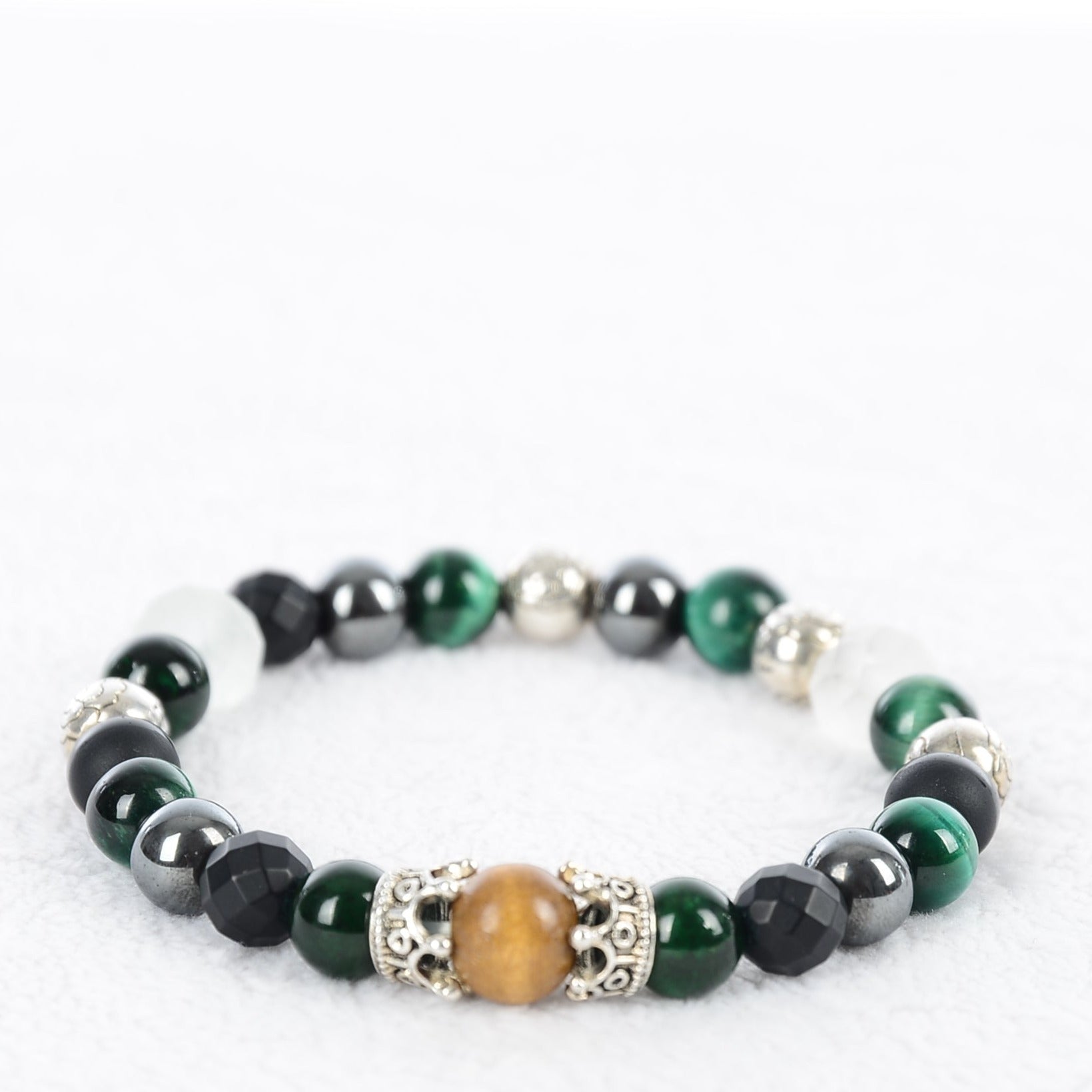 Gemstone bead bracelet made of green tiger eye and hematite made to order. 