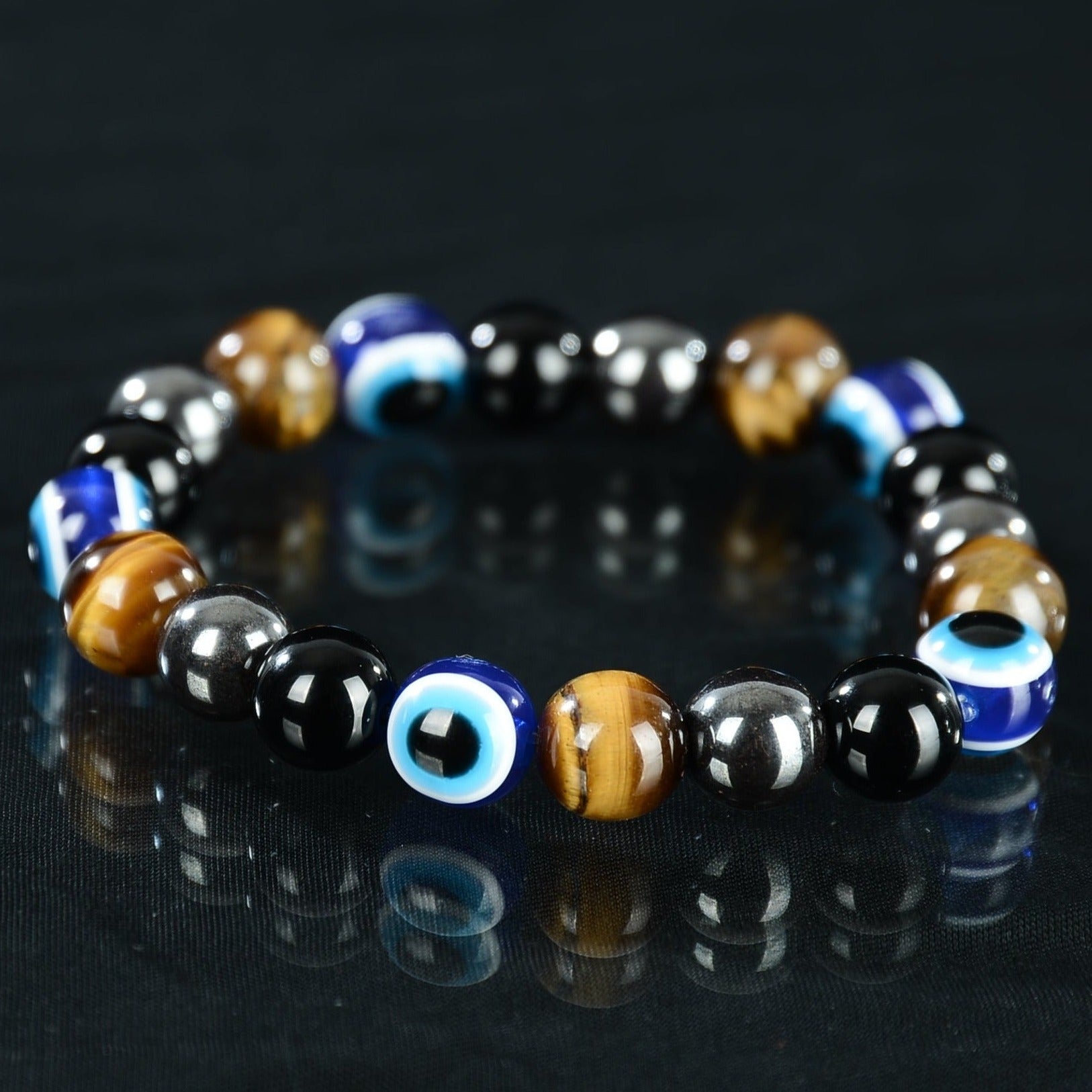 Evil ye beaded bracelet with hematite, tiger eye and black obsidian 