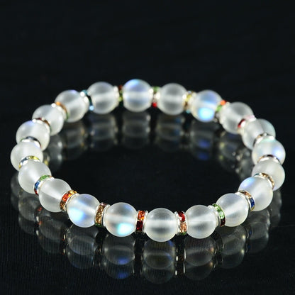 Selenite bead bracelet with rainbow spacers. Made to order.