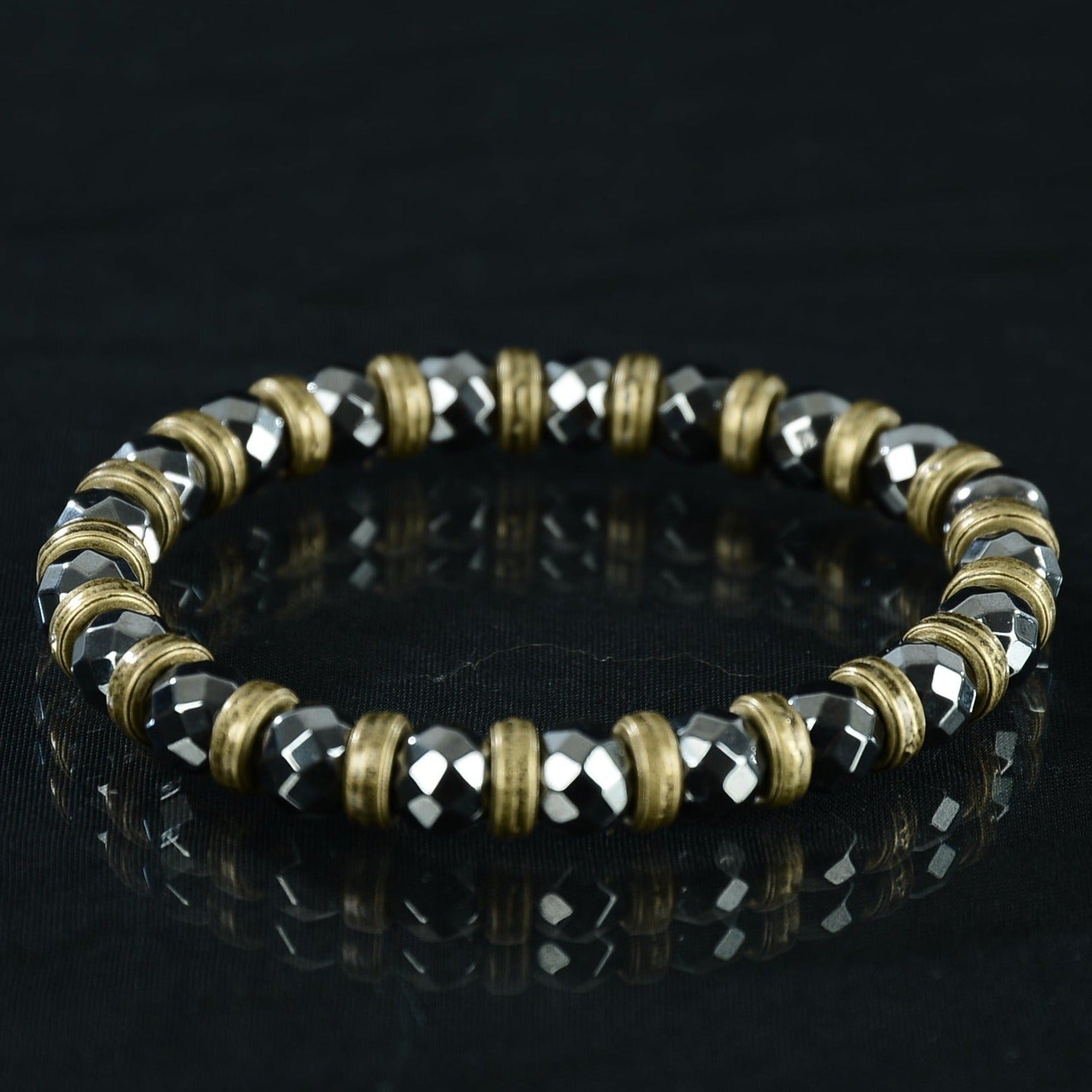 Bead bracelet made of hematite with gold spacers. Made to order. 